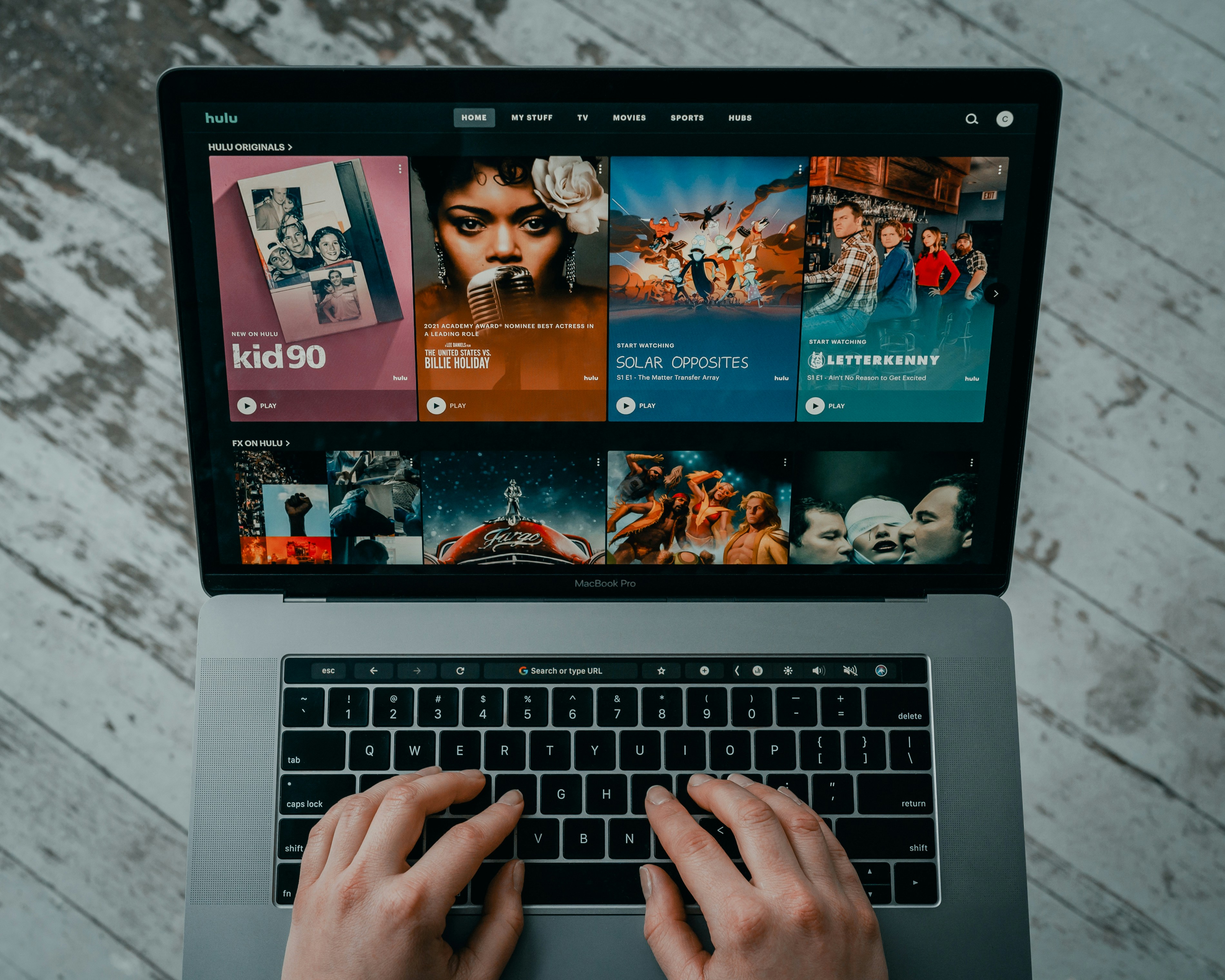 A laptop streaming Hulu