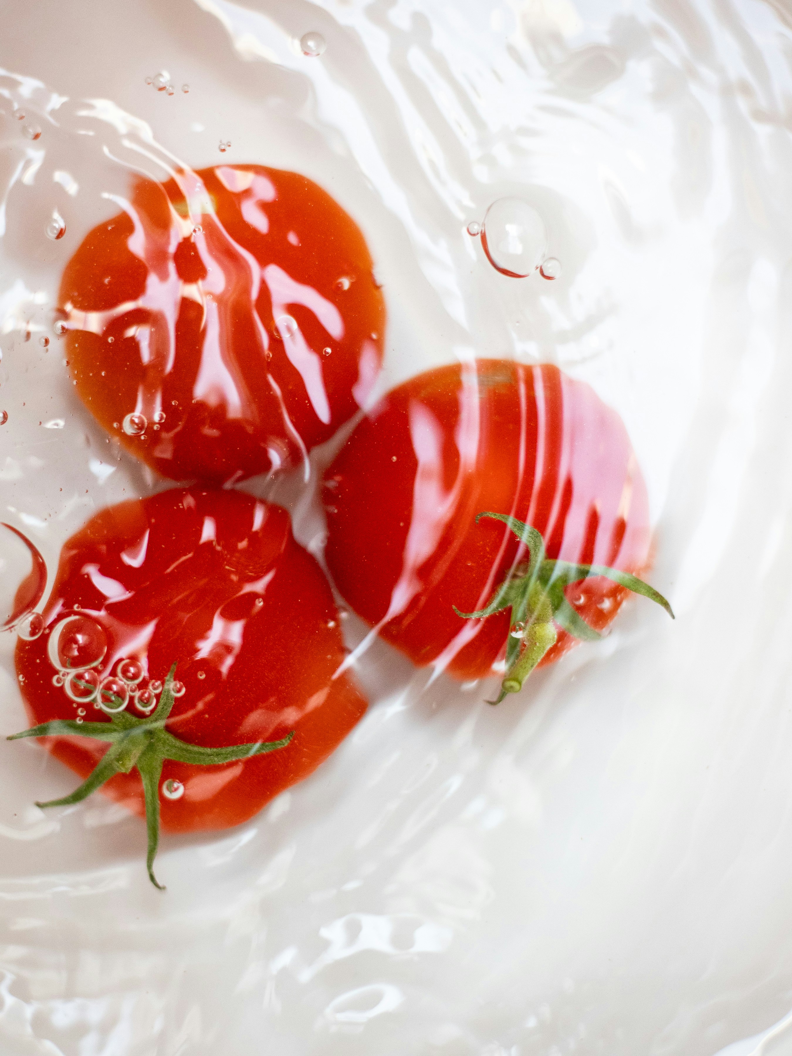 Tomatoes being washed